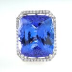 25.10CT TANZANITE & DIA 14KW HALO RING