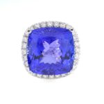 19.04CT TANZANITE & DIA 14KW HALO RING
