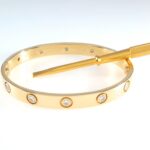 CARTIER LOVE 18KY 10DIA BRACELET SIZE 16