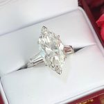 MARQUISE-CUT DIA & PLAT RING